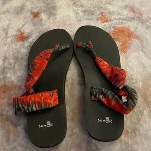 Red and black sandals